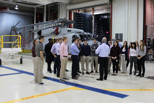 Students touring Lockheed Martin's air hangar 