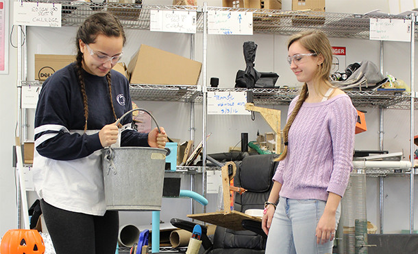 irst-year engineering students test the strength of their displaced persons shelter