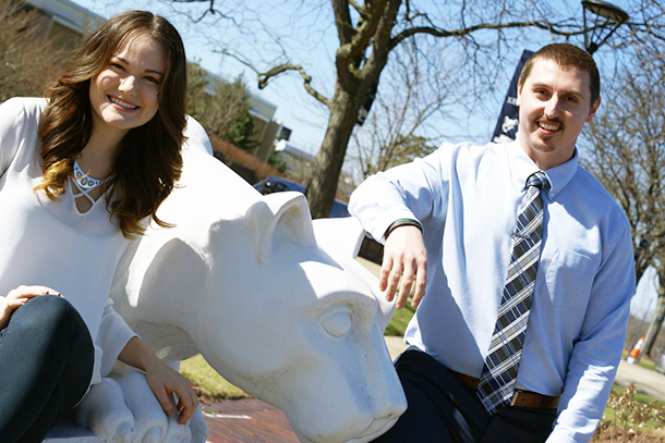 Olivia Sribniak and Anthony Gyke pose by the Nittany Lion Shrine at the New Kensington campus