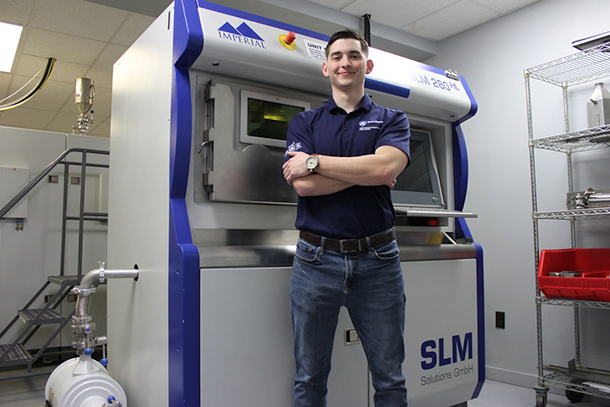 Joseph Sinclair at Imperial Machine & Tool Co. with a SLM 280HL Metal 3D-Printer.